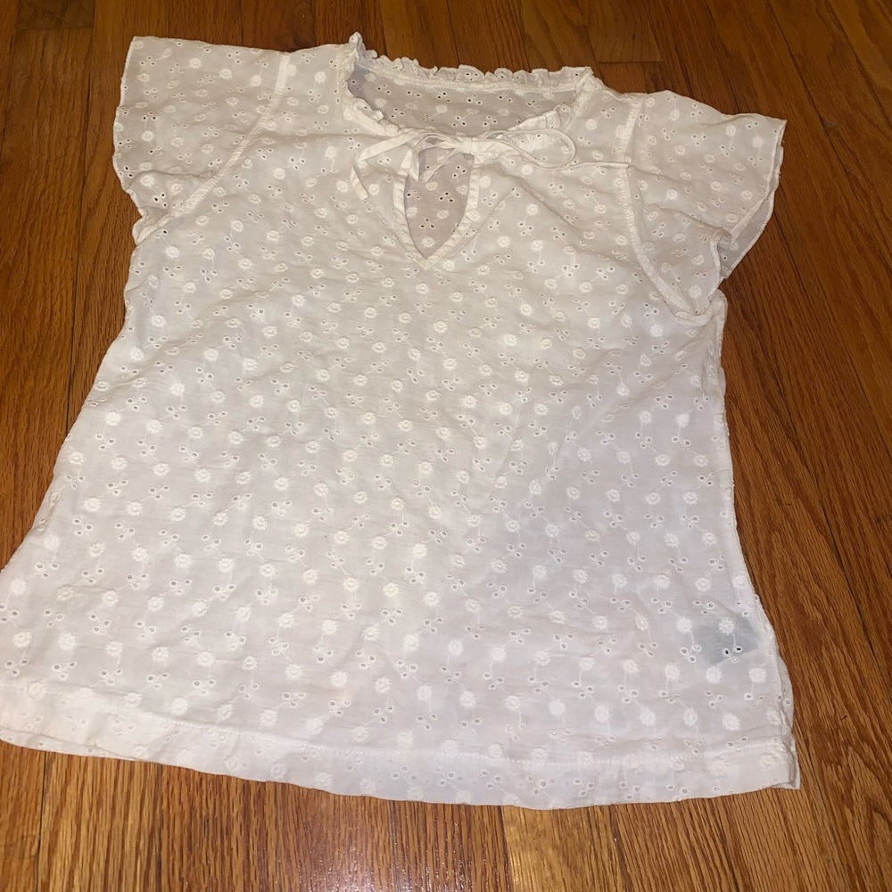 White, butterfly sleeve blouse.